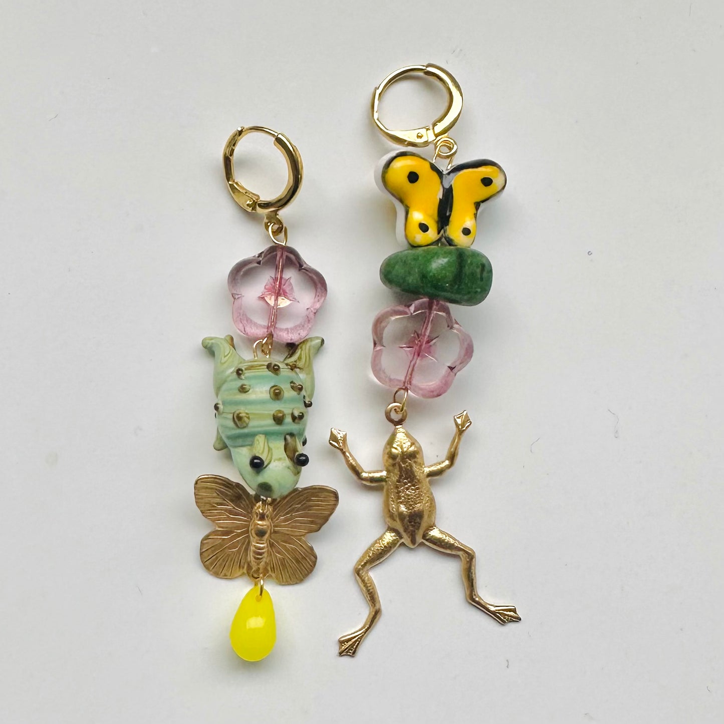 Mismatched butterfly frog earrings